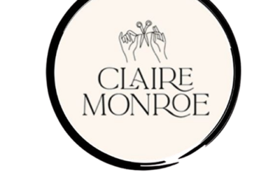 Logo: beige circular badge with a black brushstroke border, featuring two hands holding scissors above the text 'CLAIRE MONROE'.